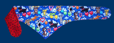 Party Animal dog bandana with paw prints